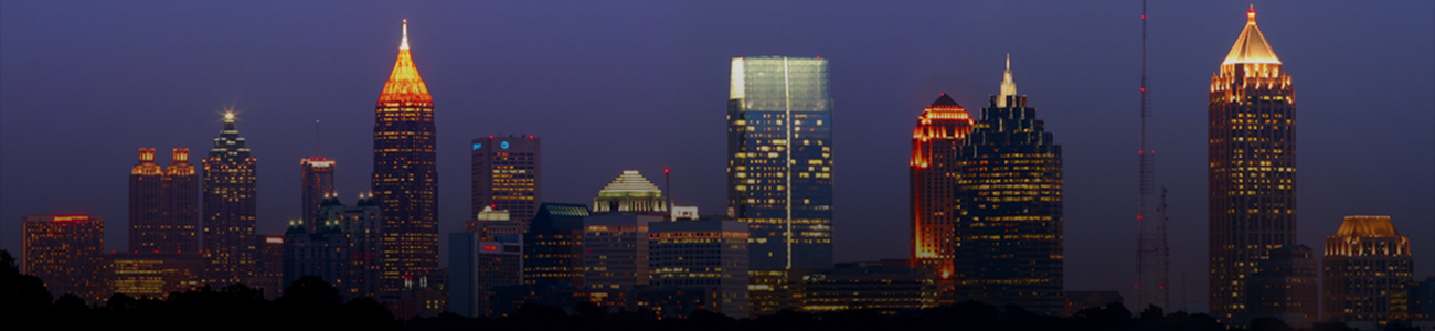 Photograph of Atlanta skyline in the night.